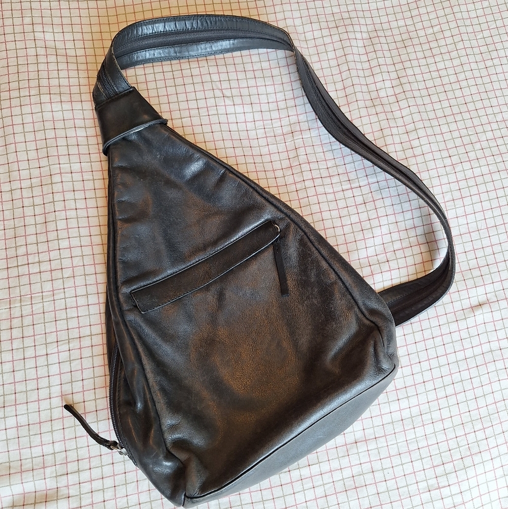 Black leather crossbody sling backpack